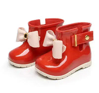 
              Bowknot boots for children
            