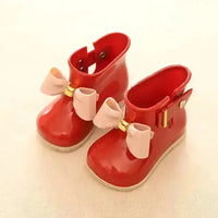 
              Bowknot boots for children
            